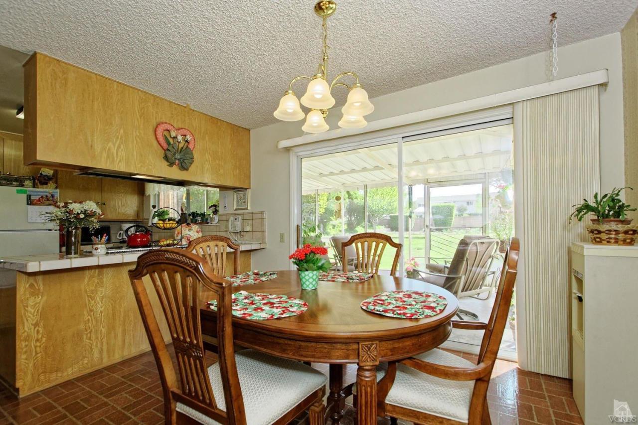5414 Parkmor Road Calabasas, CA 91302 - Photo 28 of 58 a view of a dining room with furniture window and outside view