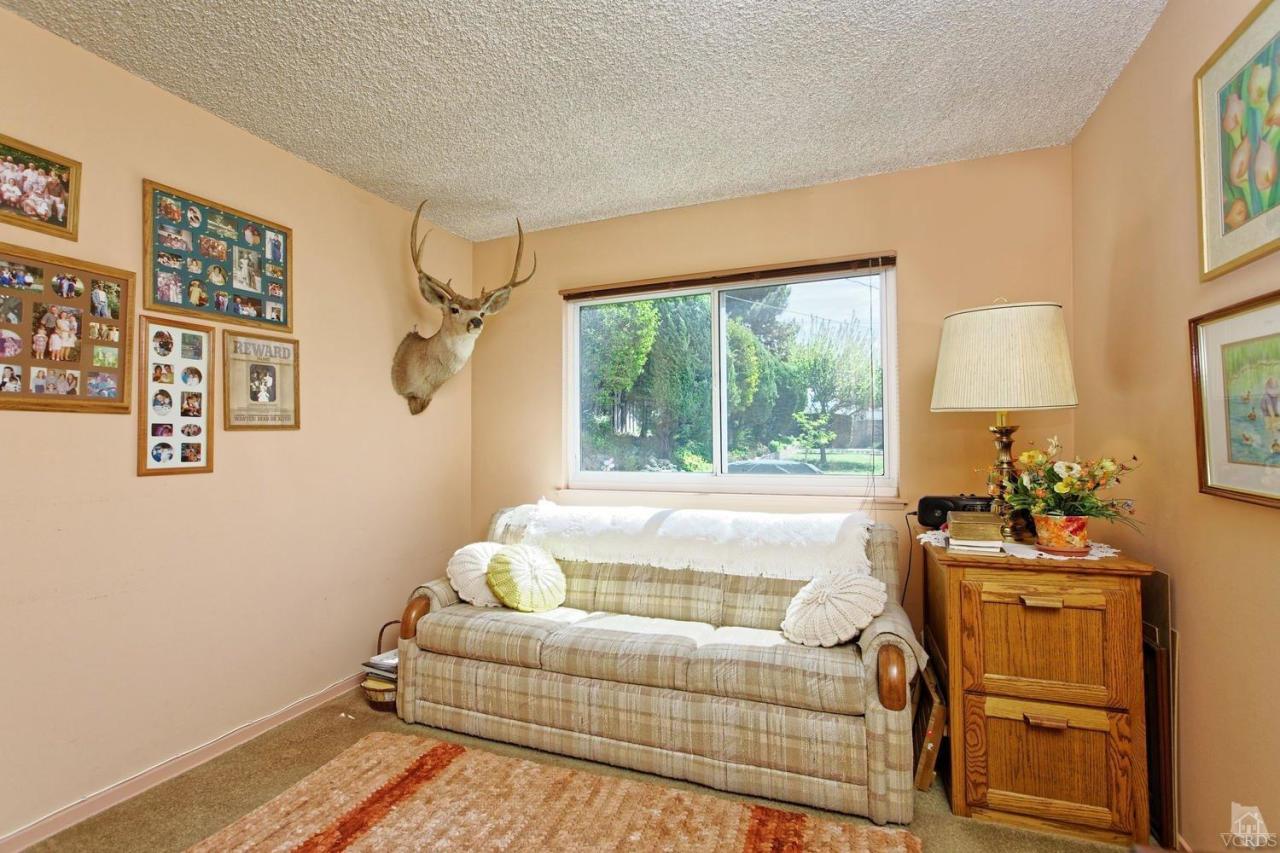5414 Parkmor Road Calabasas, CA 91302 - Photo 33 of 58 a bedroom with furniture and a large window