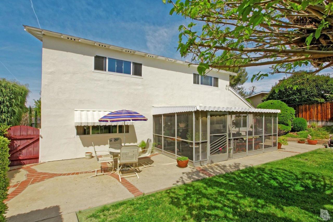 5414 Parkmor Road Calabasas, CA 91302 - Photo 46 of 58 a view of a house with a patio