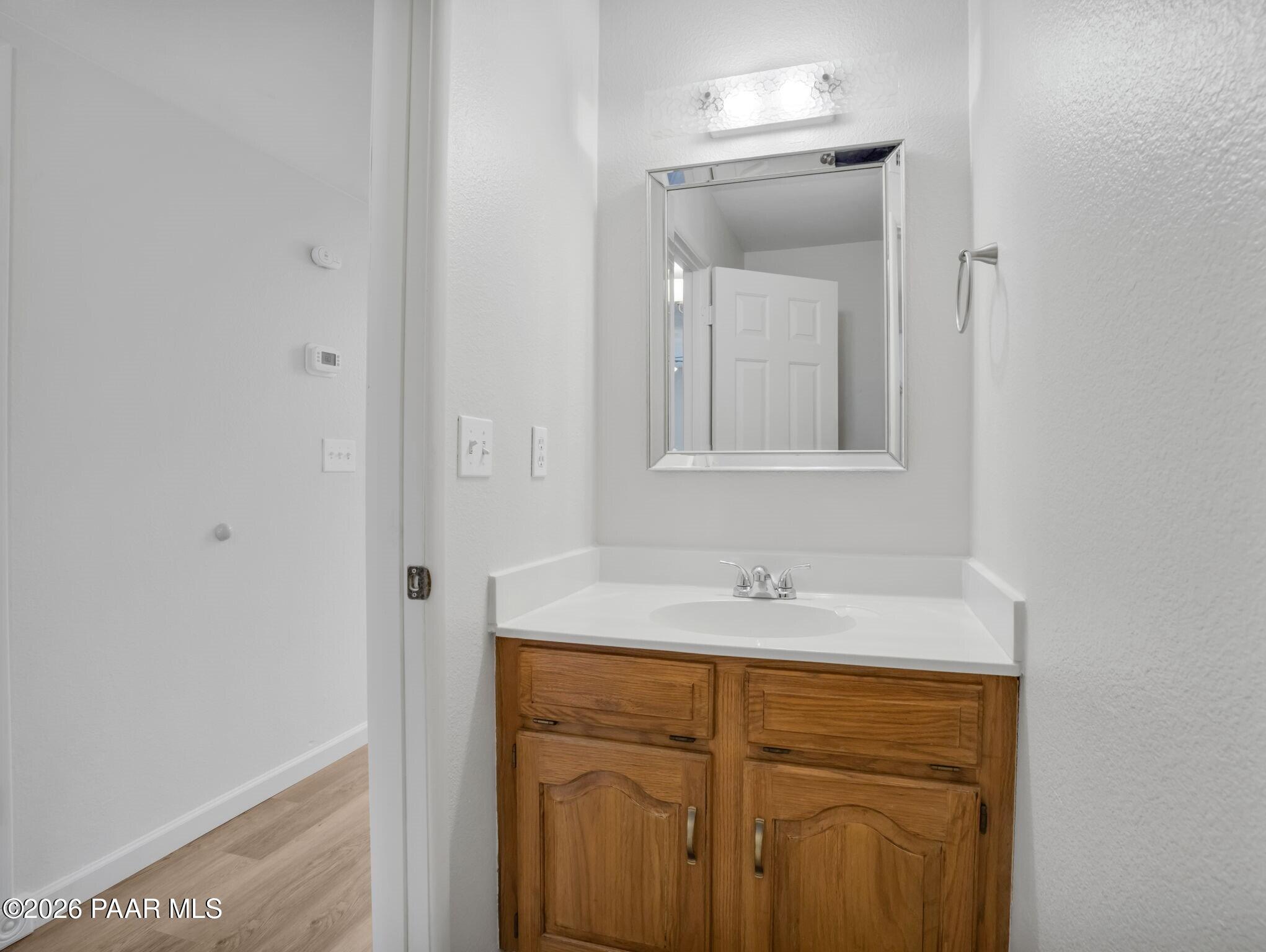 371 Rim Rock Circle Prescott, AZ 86303 - Photo 17 of 36 019_Downstairs Half Bath