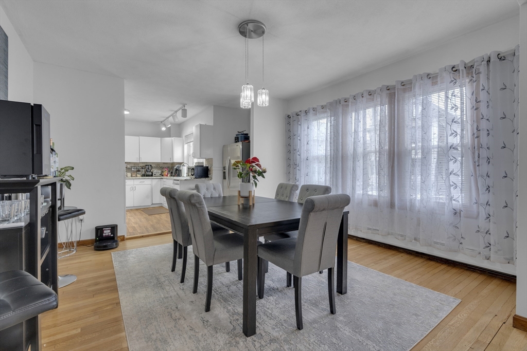 64 Commonwealth Road Watertown, MA 02472 - Photo 9 of 23 a view of a dining room with furniture window and wooden floor