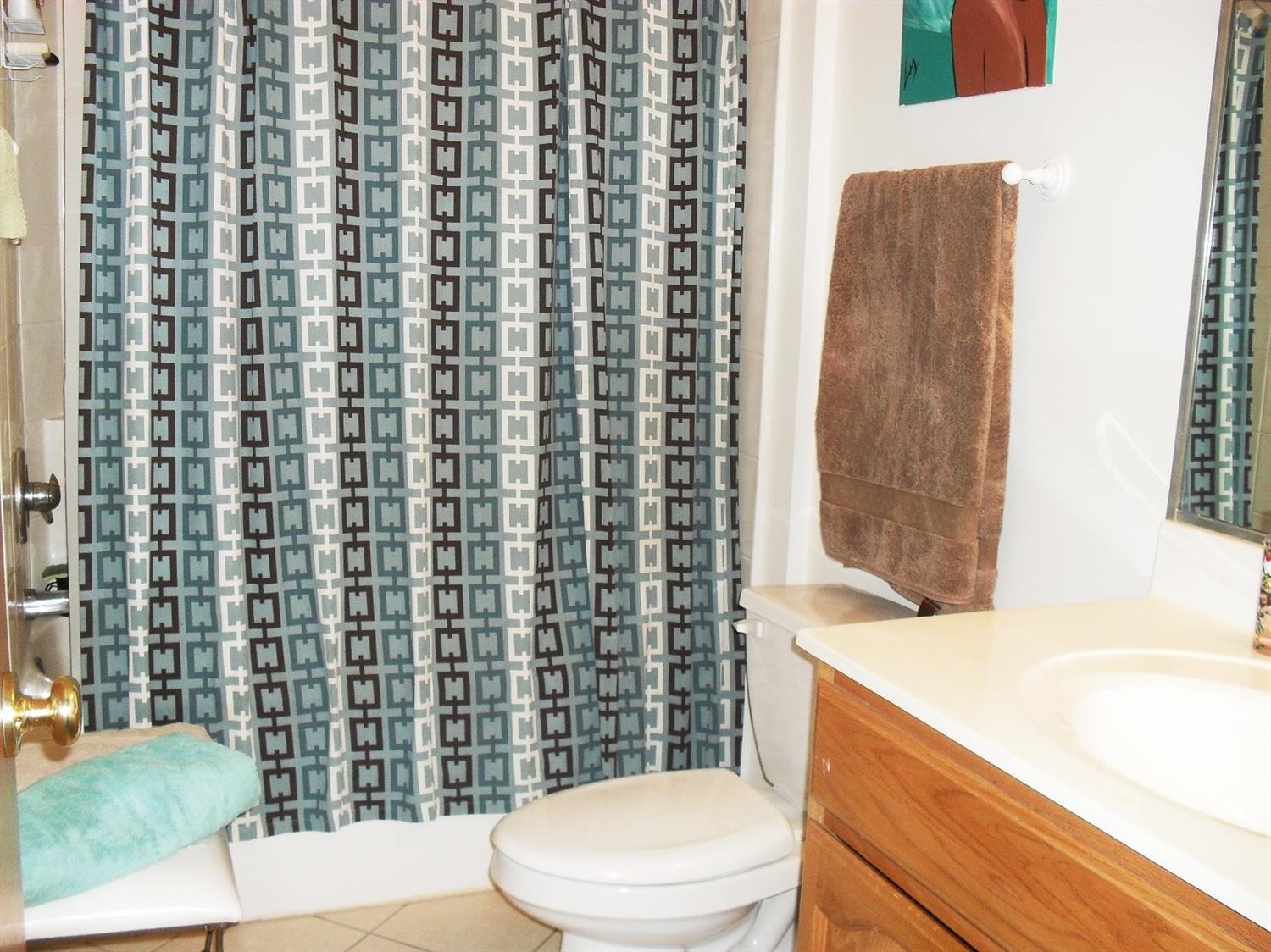 3454 Ridge Road Highland, IN 46322 - Photo 10 of 15 a bathroom with a toilet and shower