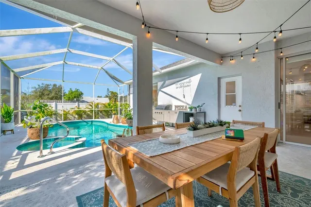 a spacious bedroom with a bed a mirror and desk