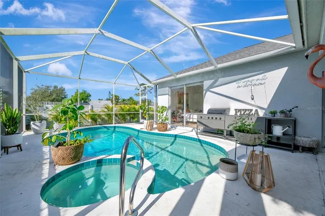 a view of walk in closet with clothes
