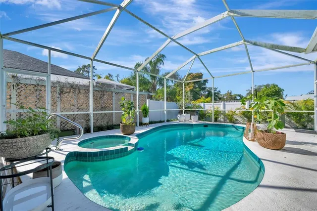 a view of a livingroom with furniture and a flat screen tv