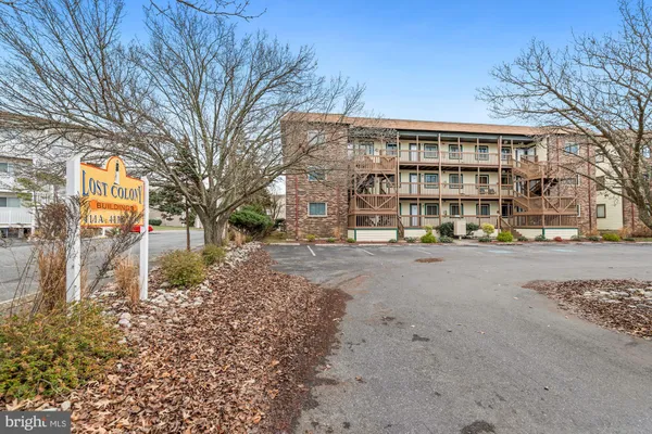 a building with trees in front of it