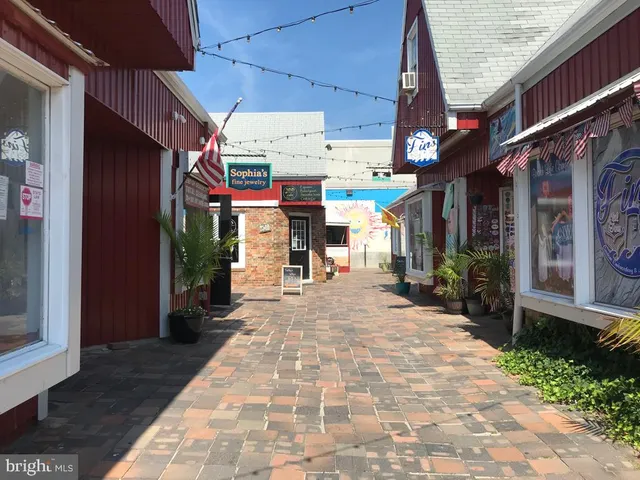 a view of shops in a street
