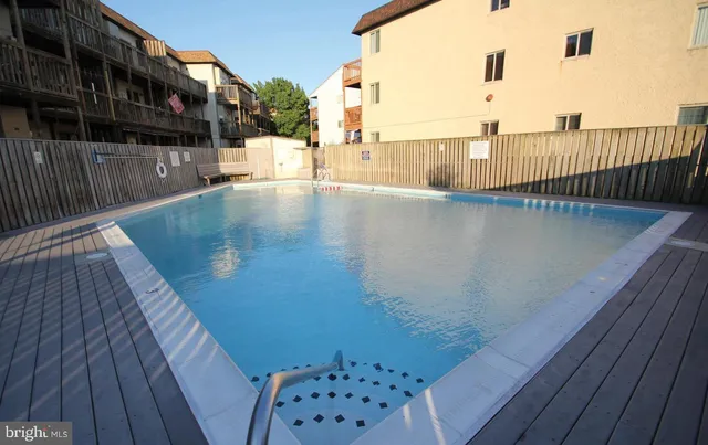 a view of balcony with wooden floor
