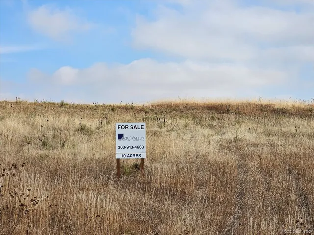 a view of a lake and mountain in the back