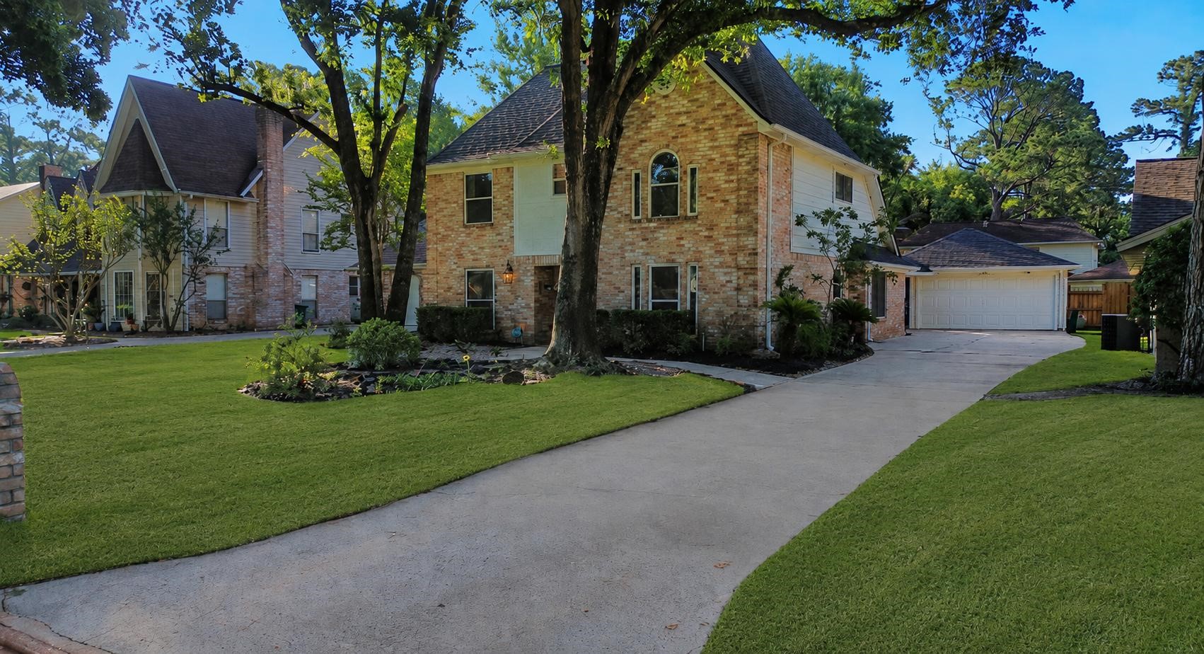 6511 Castle Pine Lane Spring, TX 77379 - Photo 2 of 49 Expansive driveway provides ample parking.