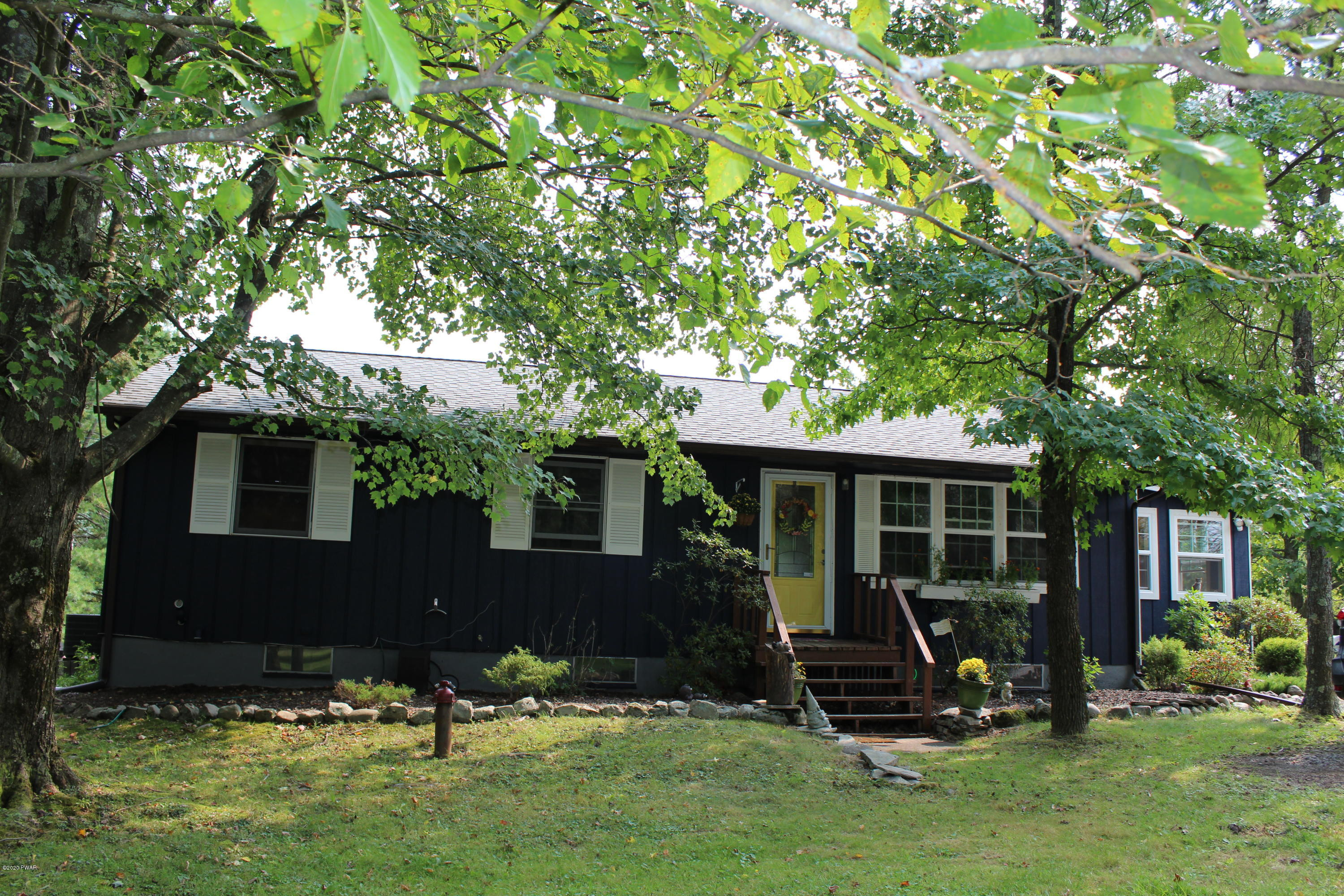 798 Goose Pond Road Lake Ariel, PA 18436 - Photo 2 of 47 a view of a house with backyard tub and a tree