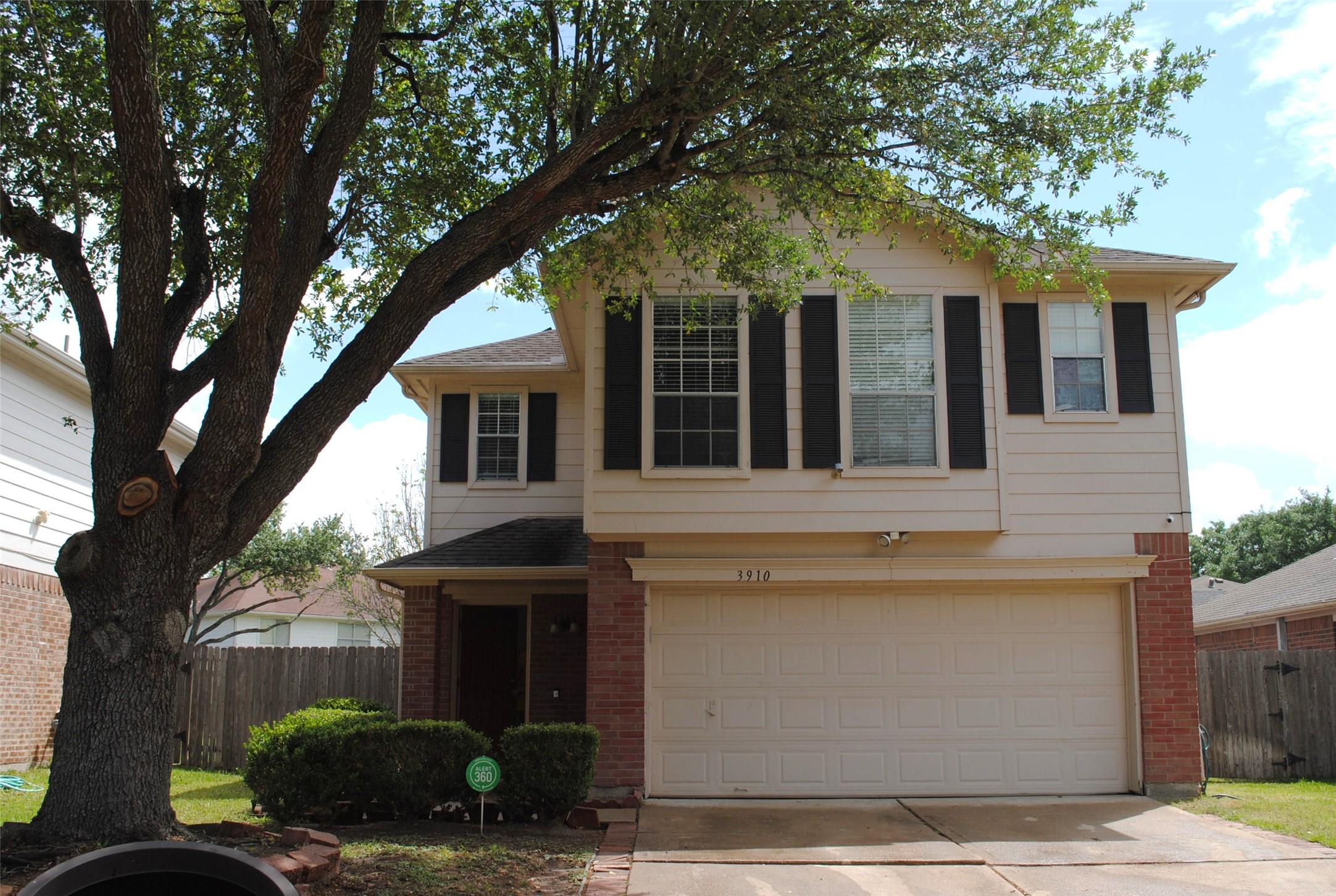 3910 Starbridge Pointe Lane Katy, TX 77449 - Photo 1 of 39 a front view of a house with garden