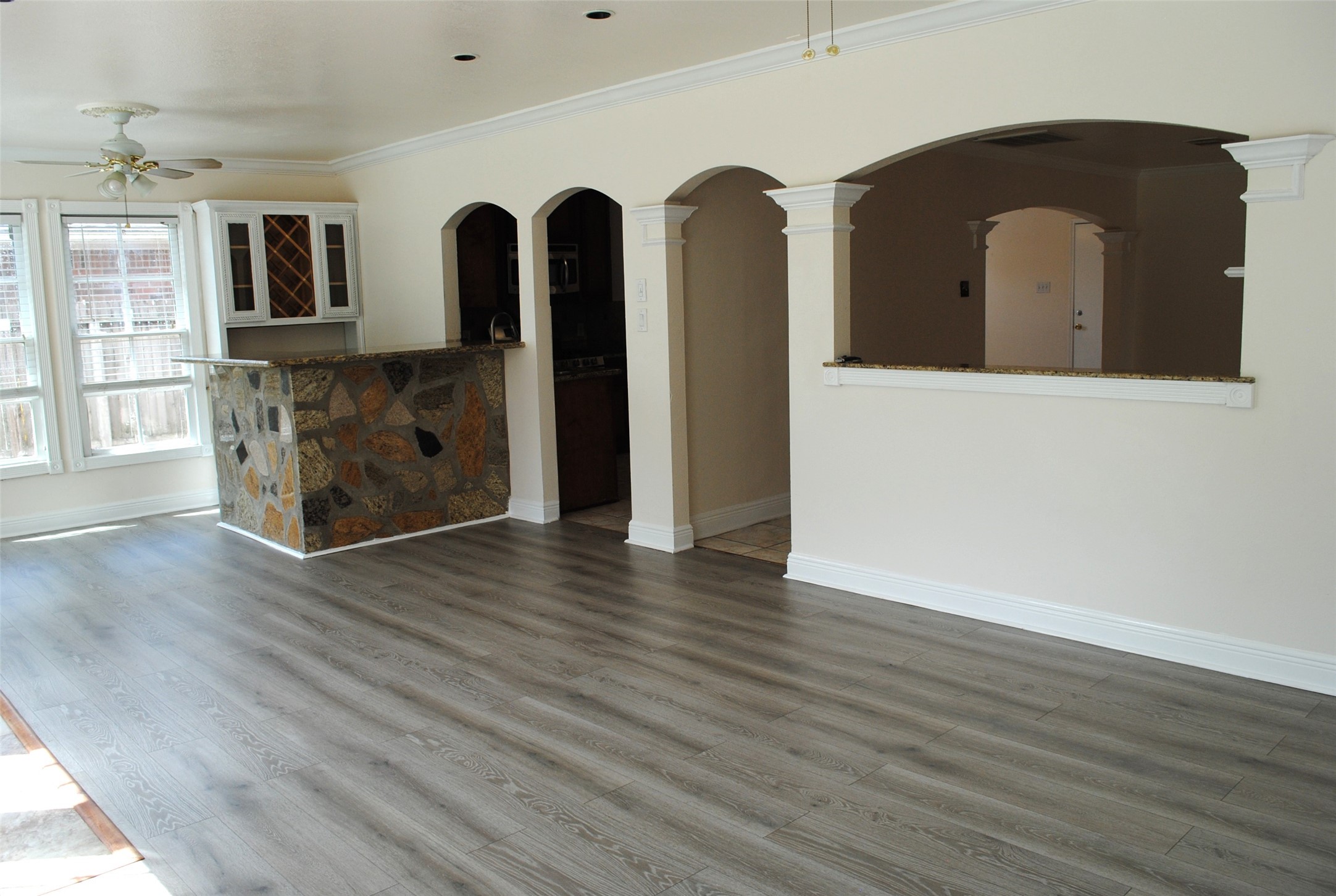 3910 Starbridge Pointe Lane Katy, TX 77449 - Photo 16 of 39 a view of a living room with wooden floor