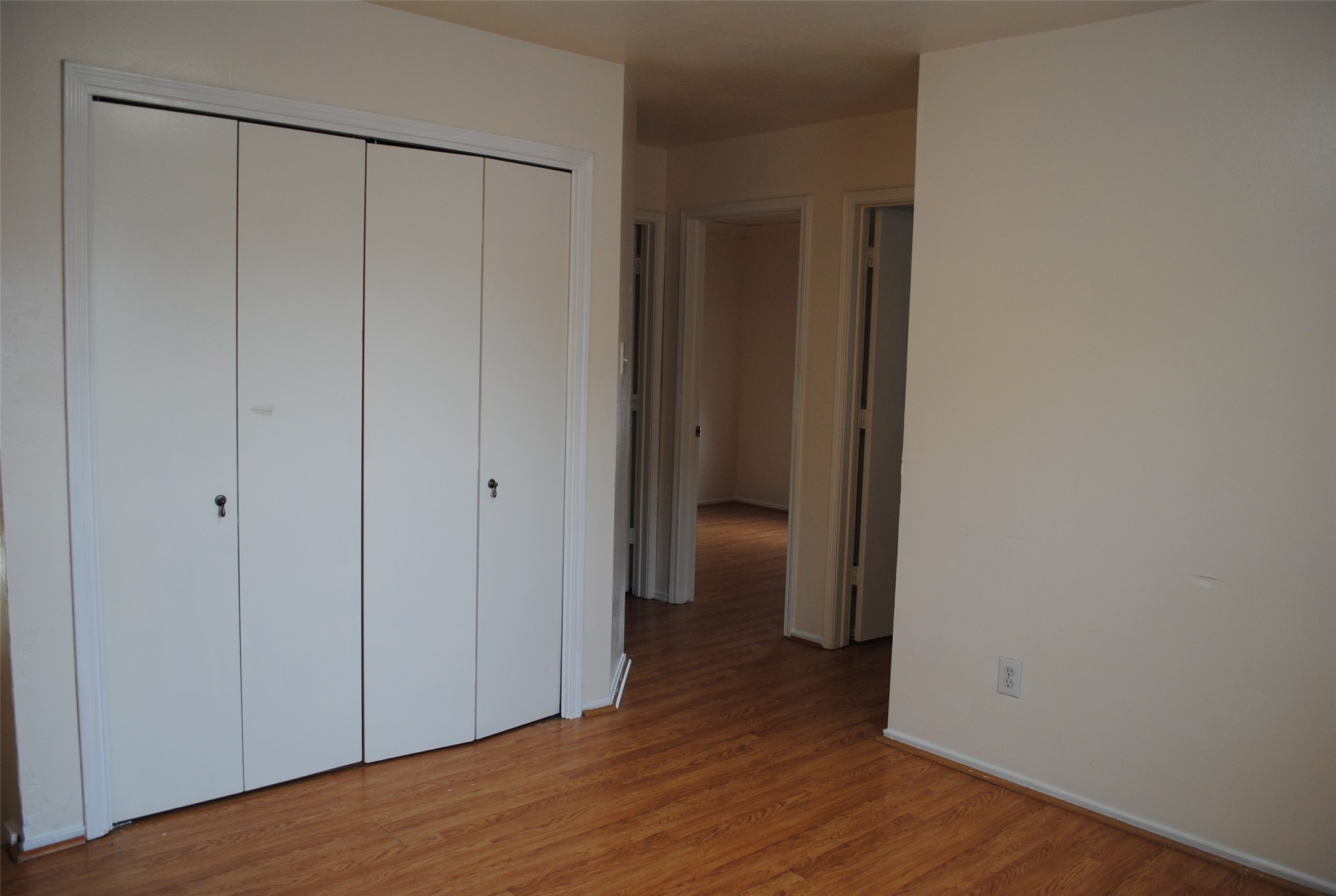 3910 Starbridge Pointe Lane Katy, TX 77449 - Photo 21 of 39 a view of an empty room with wooden floor