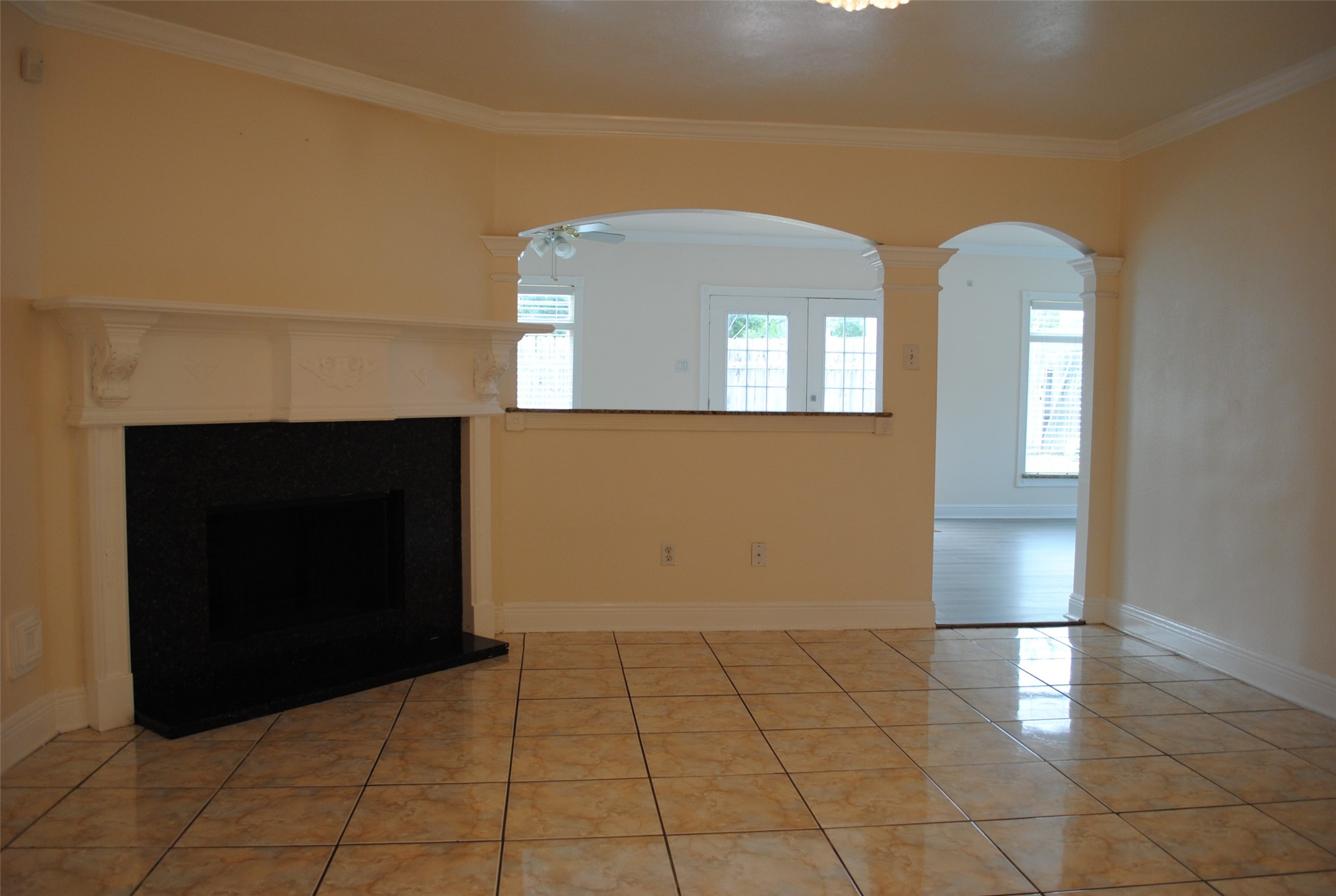 3910 Starbridge Pointe Lane Katy, TX 77449 - Photo 5 of 39 a view of a livingroom with wooden floor and a fireplace