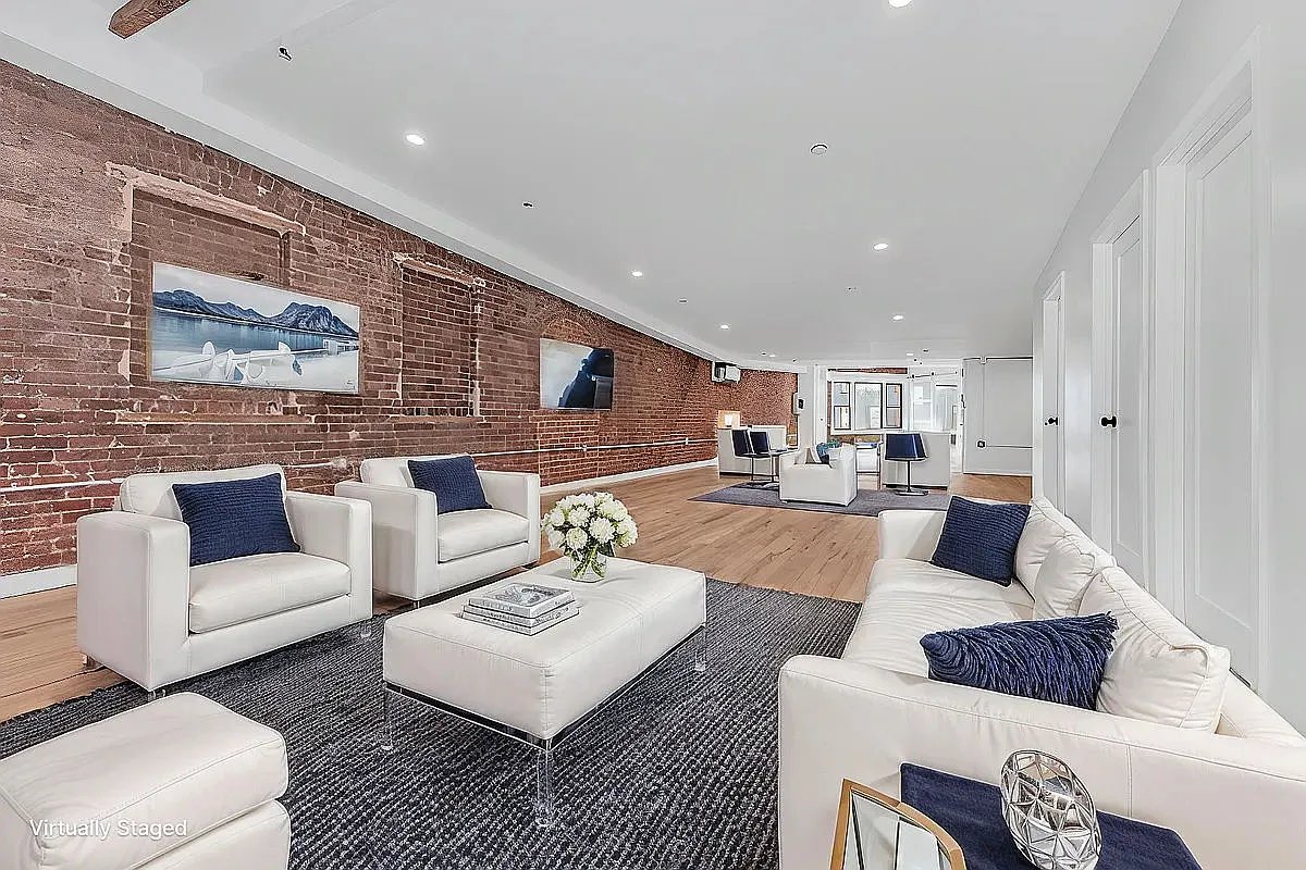 a living room with furniture and a couch