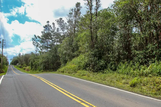 a view of a city street from a balcony