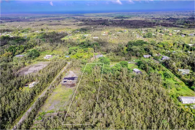 a view of a lush green field