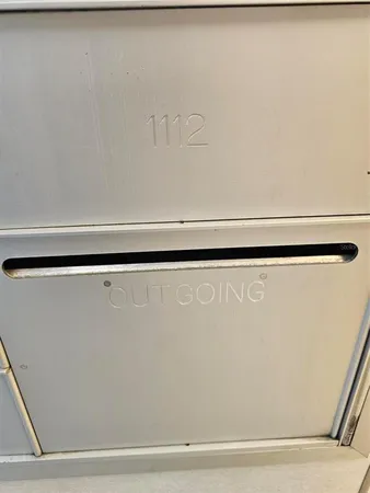 a room with furniture pool table gym equipment and a window