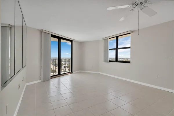 a view of an empty room with a window