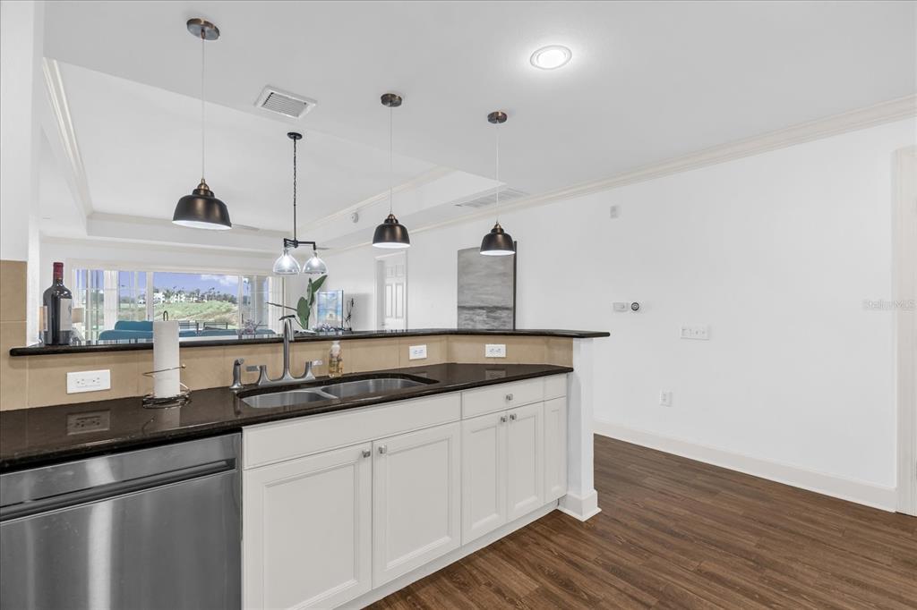 1362 Centre Ct Ridge Drive, Unit 102 Reunion, FL 34747 - Photo 9 of 35 a kitchen with sink and window