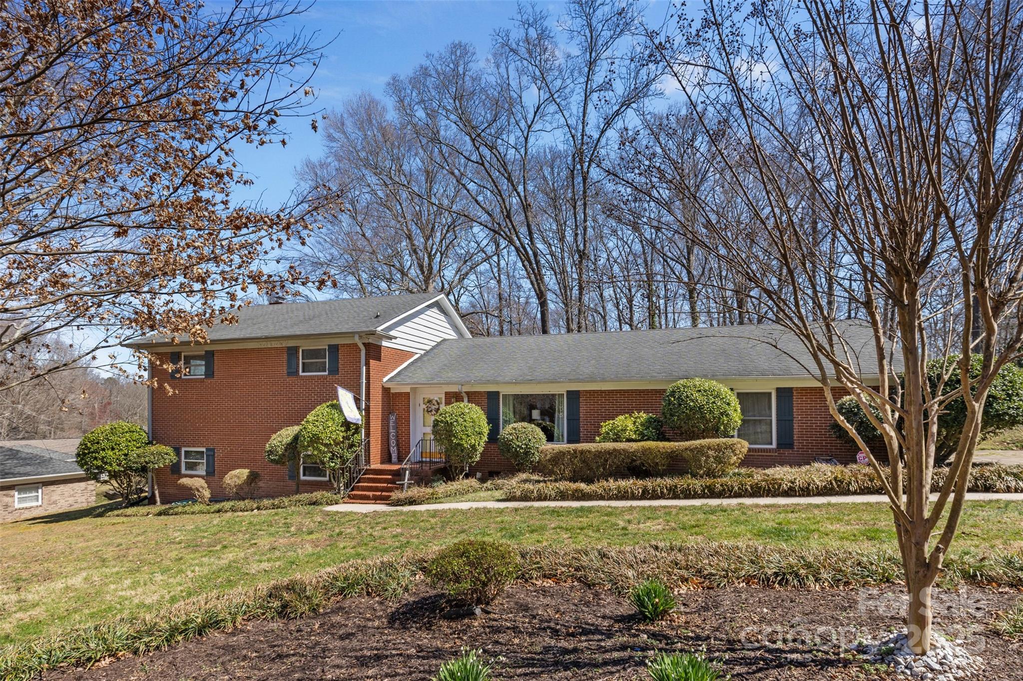 211 Kingsway Circle Charlotte, NC 28214 - Photo 1 of 38 a view of a house with yard and a tree