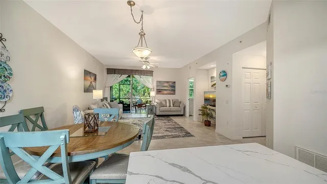 a bedroom with a bed and ceiling fan