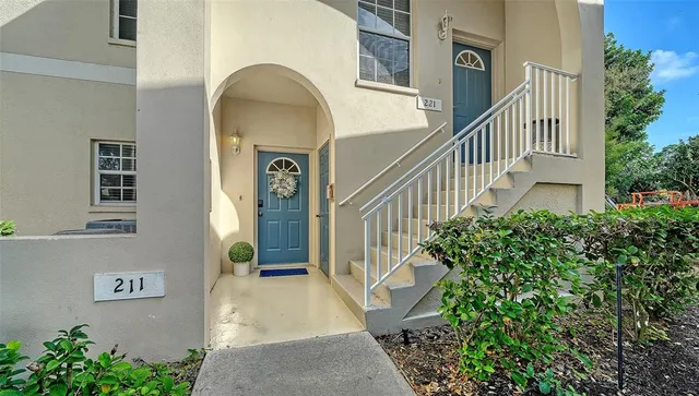 a kitchen with a stove a sink and a refrigerator
