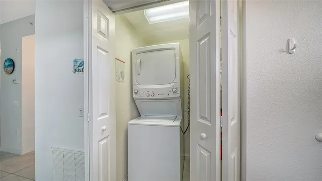 a projector room with furniture and a flat screen tv