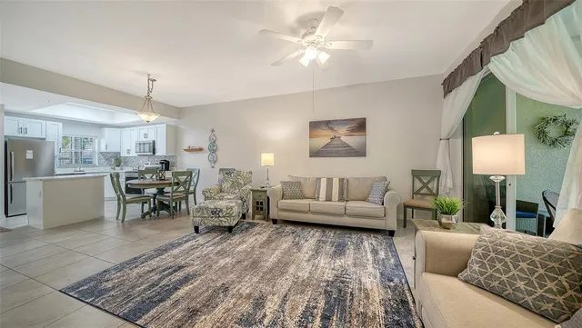 a kitchen with a stove a sink and a refrigerator