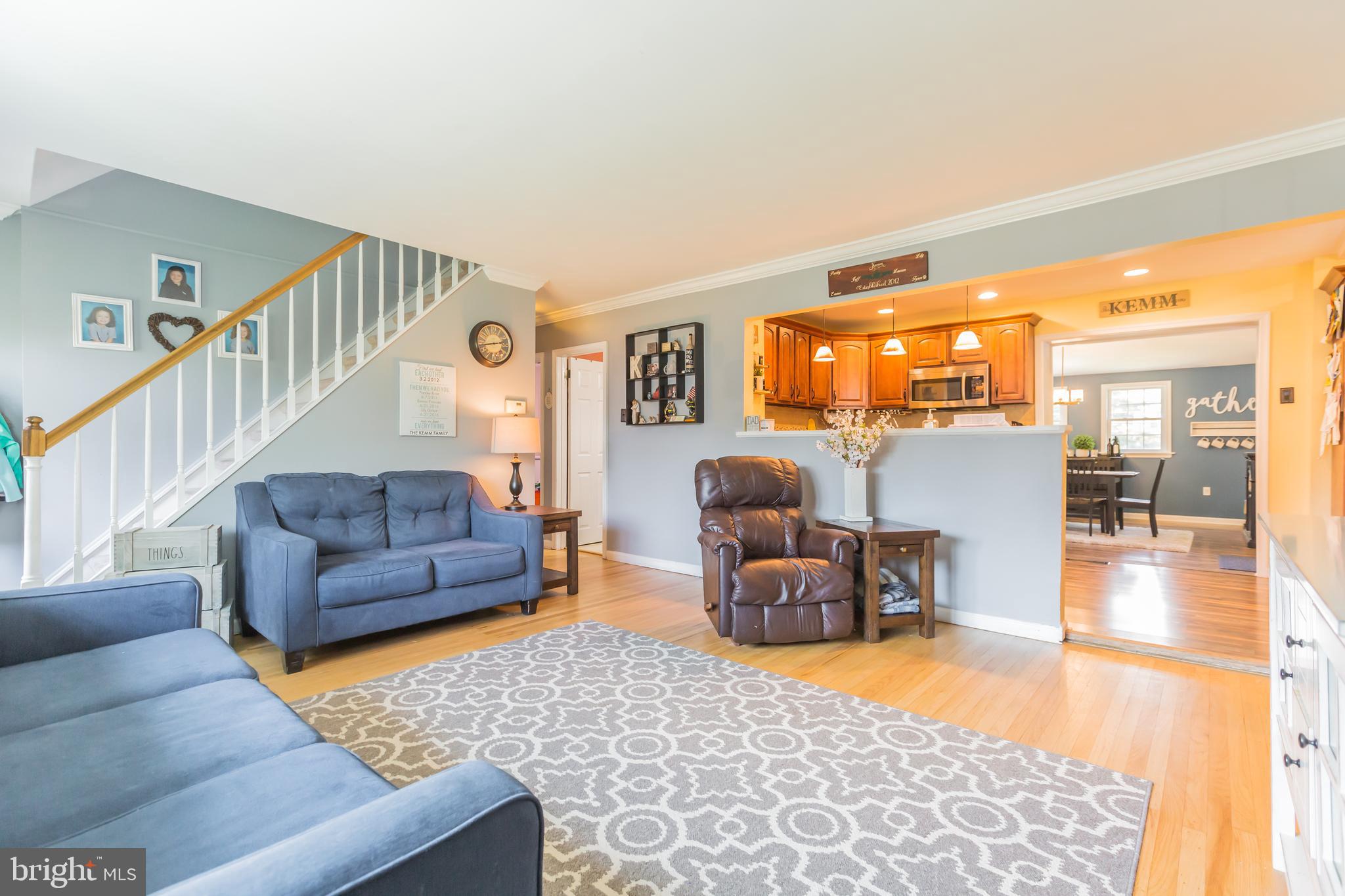 911 Scotia Road Philadelphia, PA 19128 - Photo 4 of 27 a living room with furniture and a dining table