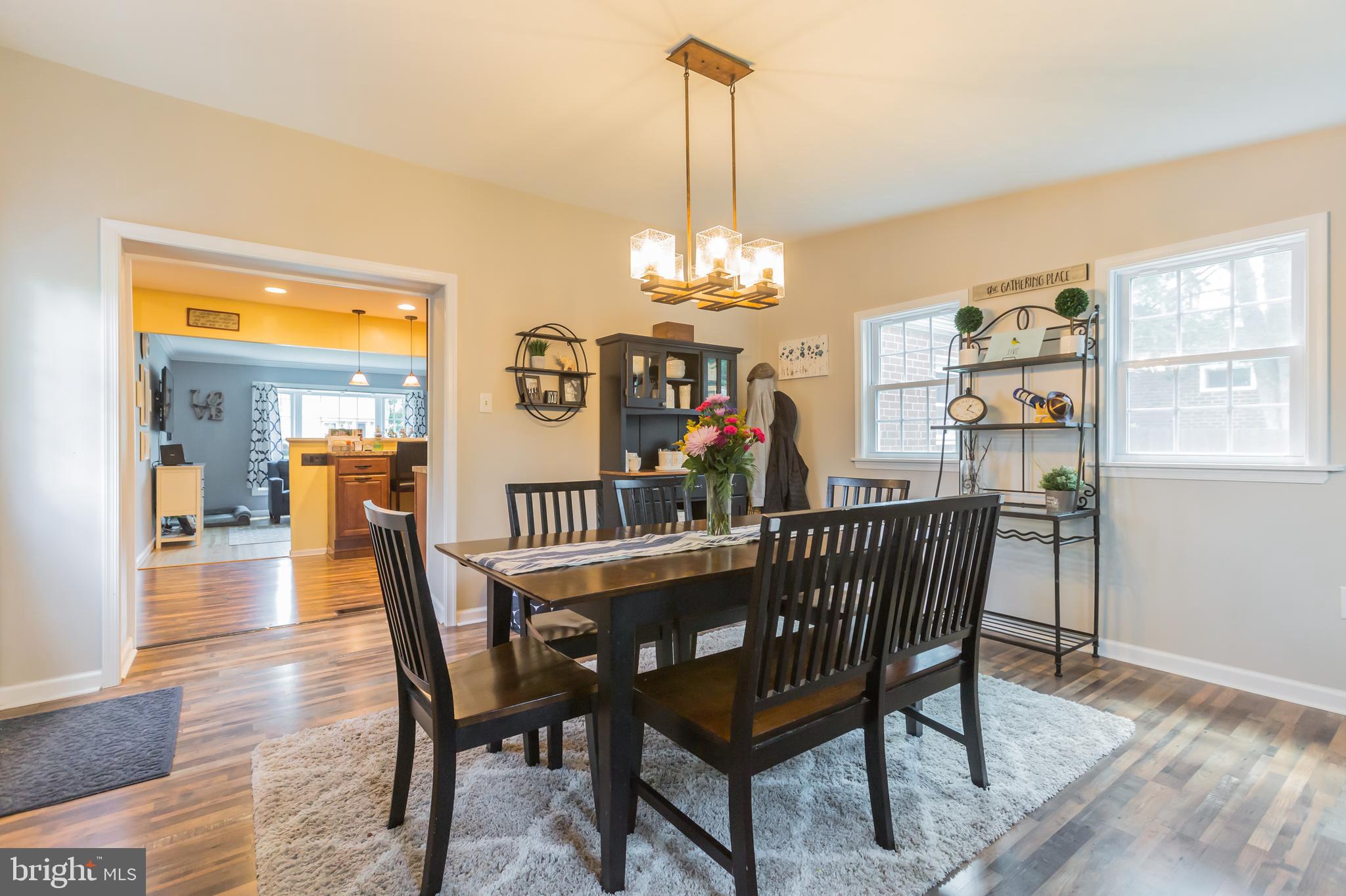 911 Scotia Road Philadelphia, PA 19128 - Photo 6 of 27 a view of a dining room with furniture window and wooden floor