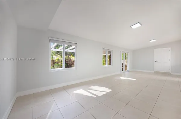 an empty room with windows