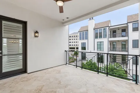 a view of a balcony with staircase