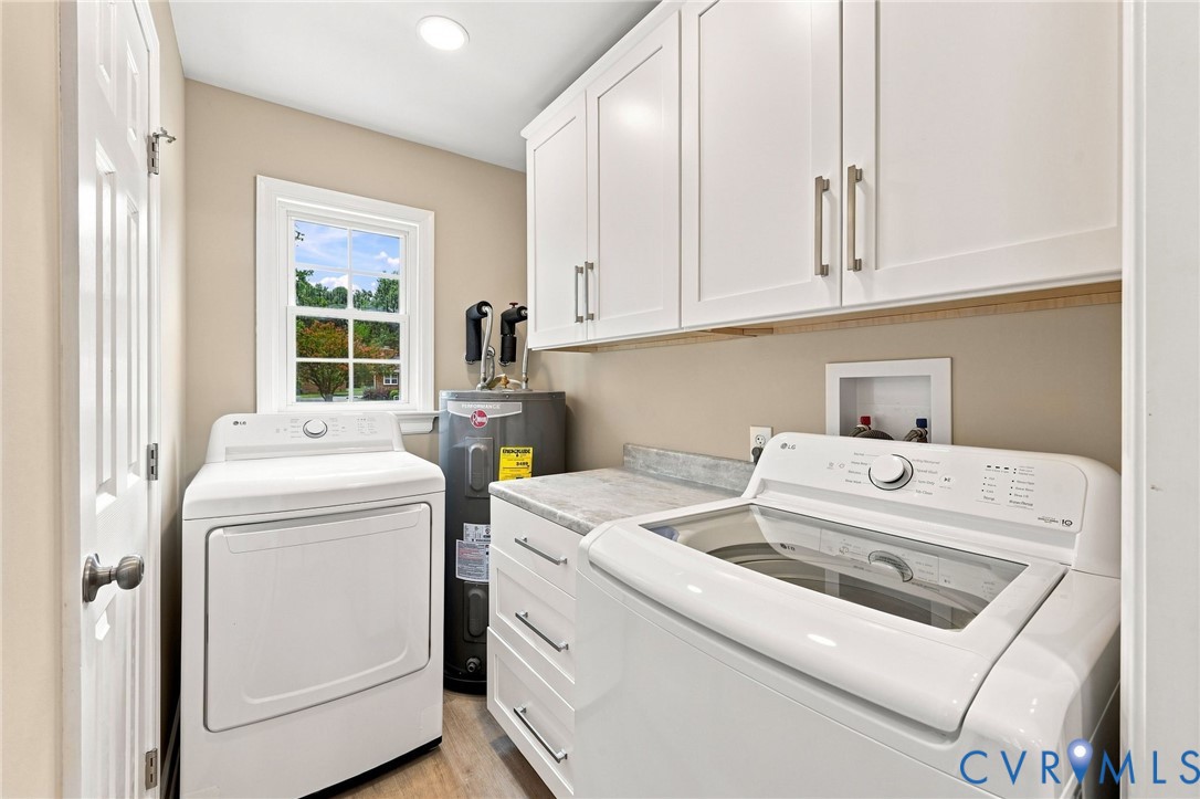 3221 Clintwood Road Midlothian, VA 23112 - Photo 17 of 46 Laundry area featuring shaker-style upper cabinetr