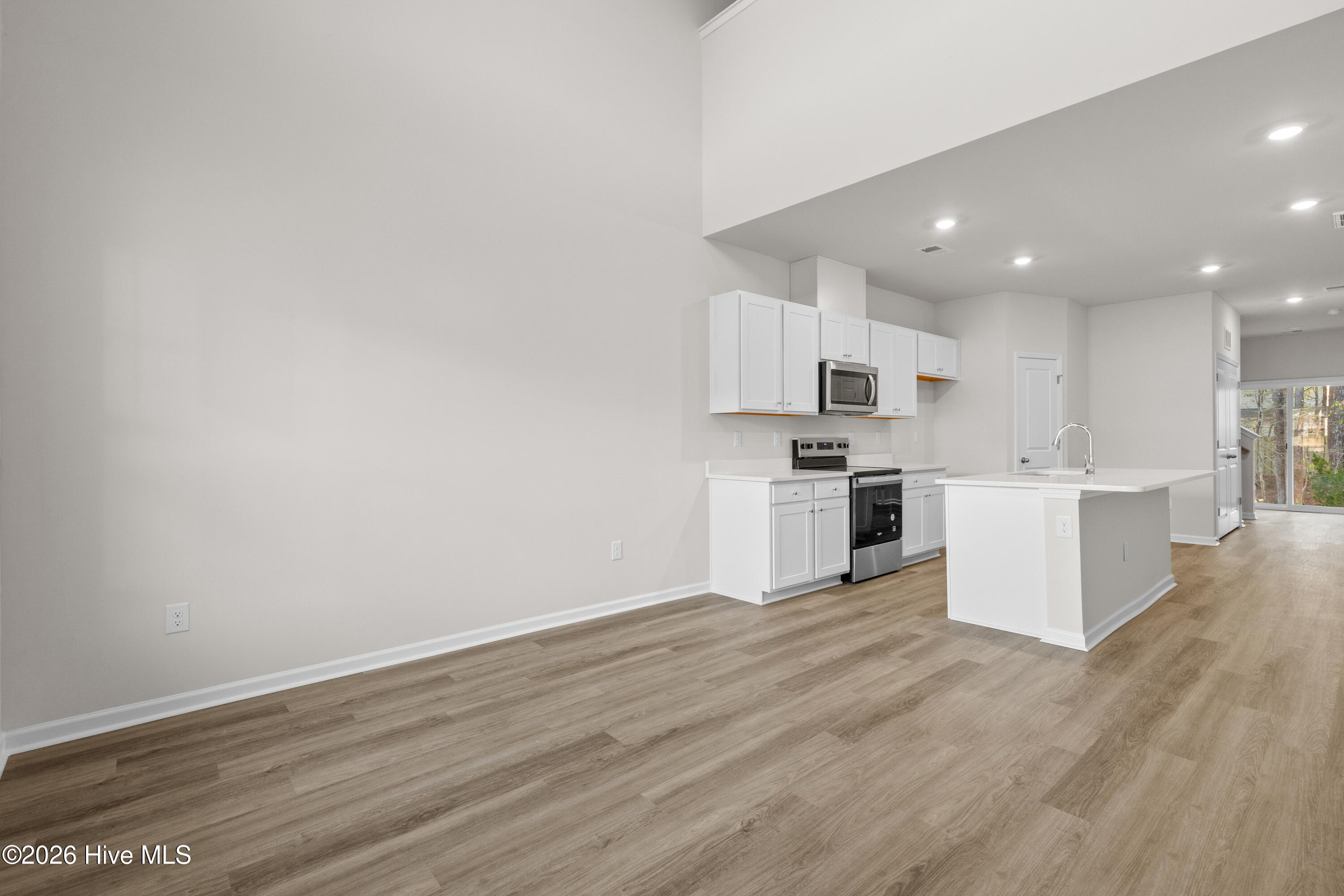 816 Palm Frond Way Calabash, NC 28467 - Photo 27 of 30 White cabinets throughout the home