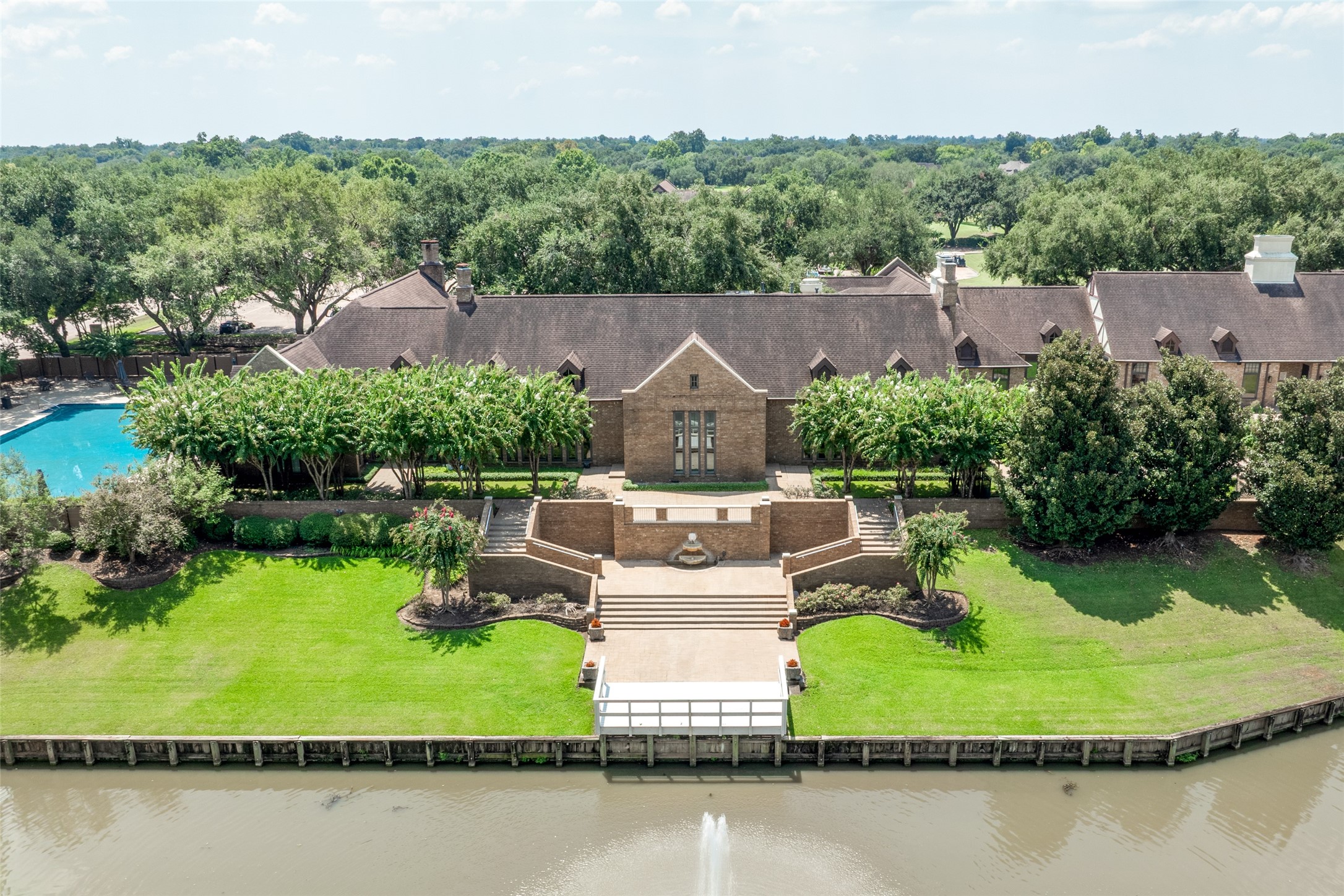 5303 Windrush Street Fulshear, TX 77441 - Photo 17 of 21 an aerial view of a house with a yard and lake view