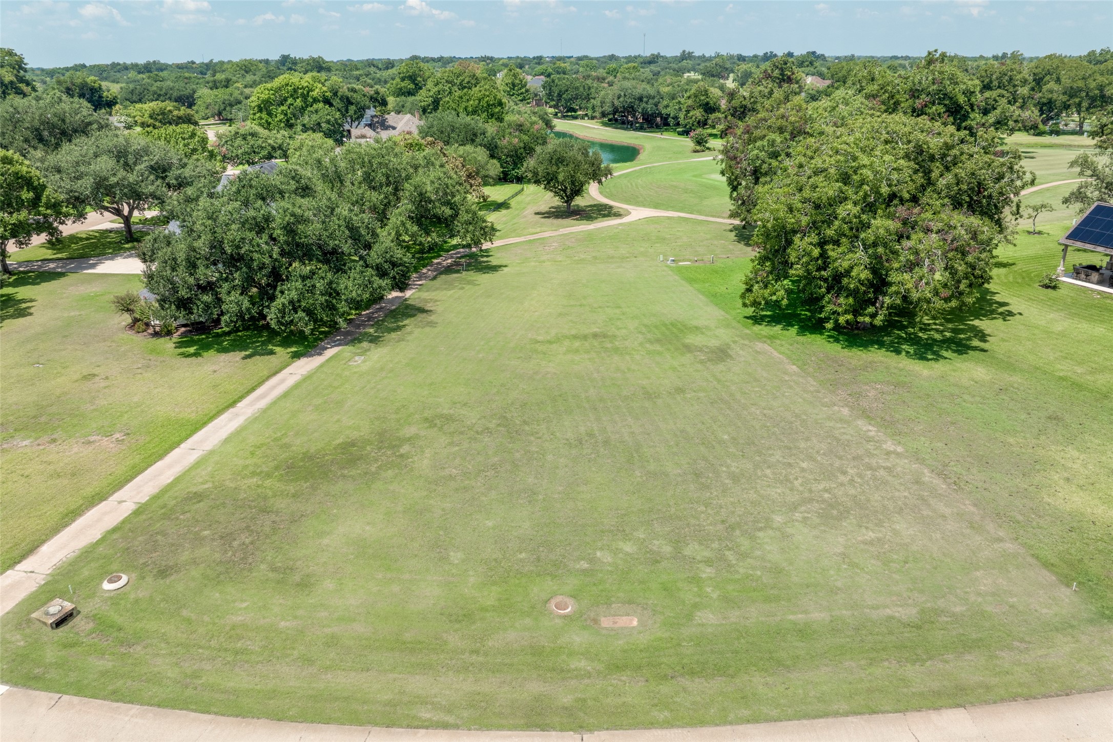 5303 Windrush Street Fulshear, TX 77441 - Photo 3 of 21 a view of a yard with an outdoor space
