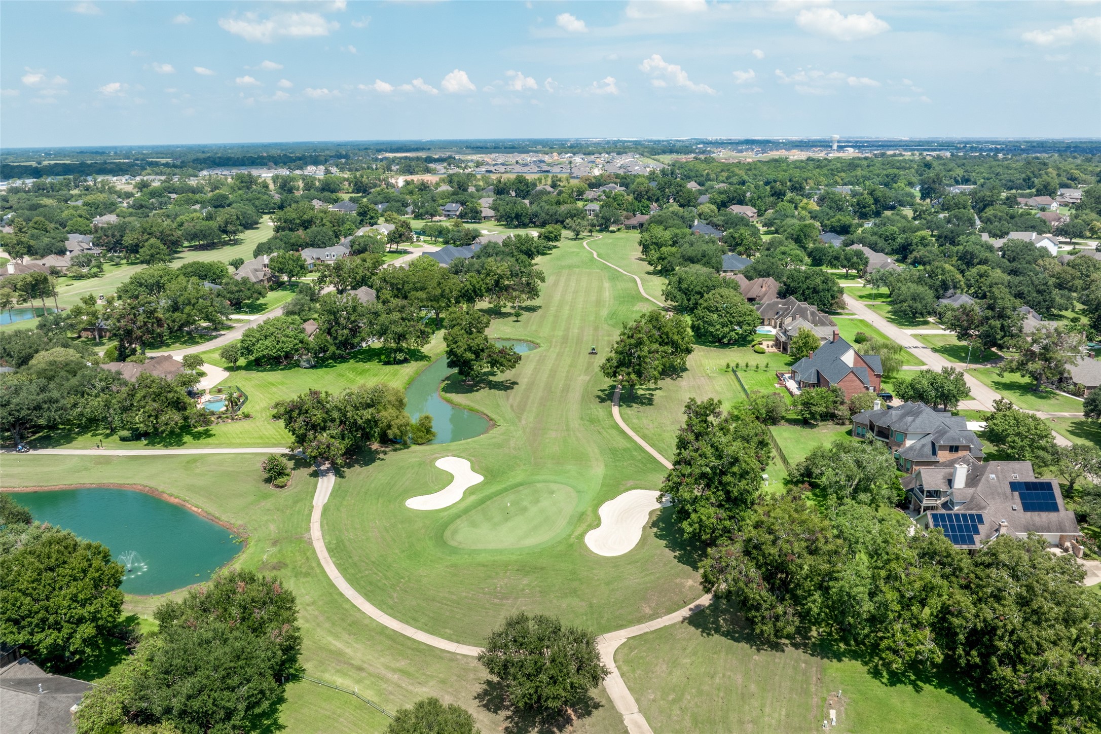 5303 Windrush Street Fulshear, TX 77441 - Photo 8 of 21 an aerial view of a residential houses with outdoor space and trees all around
