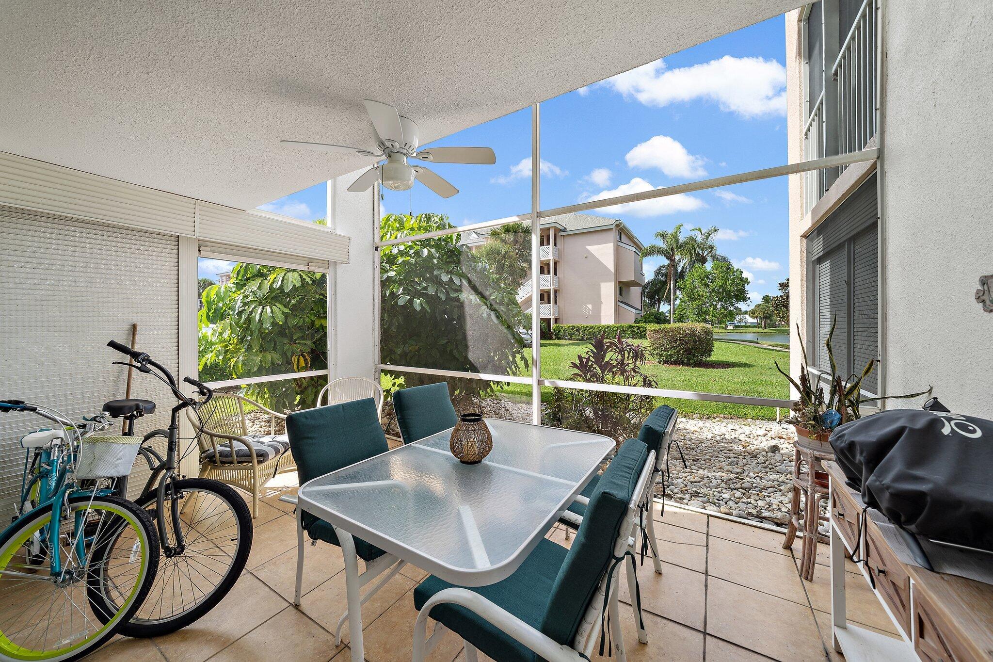 353 Highway 1, Unit D101 Jupiter, FL 33477 - Photo 17 of 32 a view of a dining room with furniture window and outside view