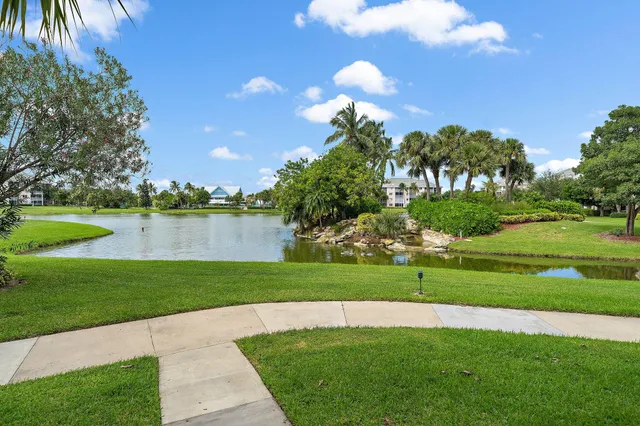 a view of a golf course with a lake