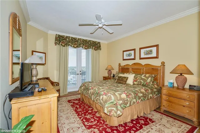 a bedroom with a bed and dresser