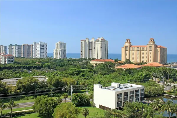 a view of a city with tall buildings