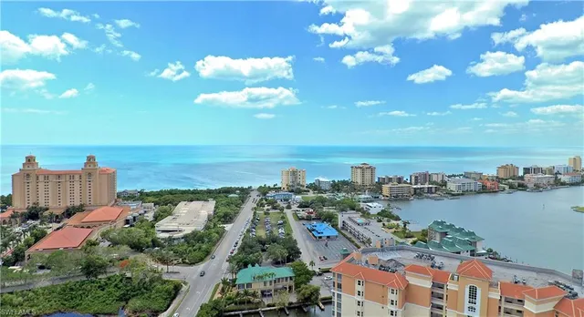 a view of a city with ocean