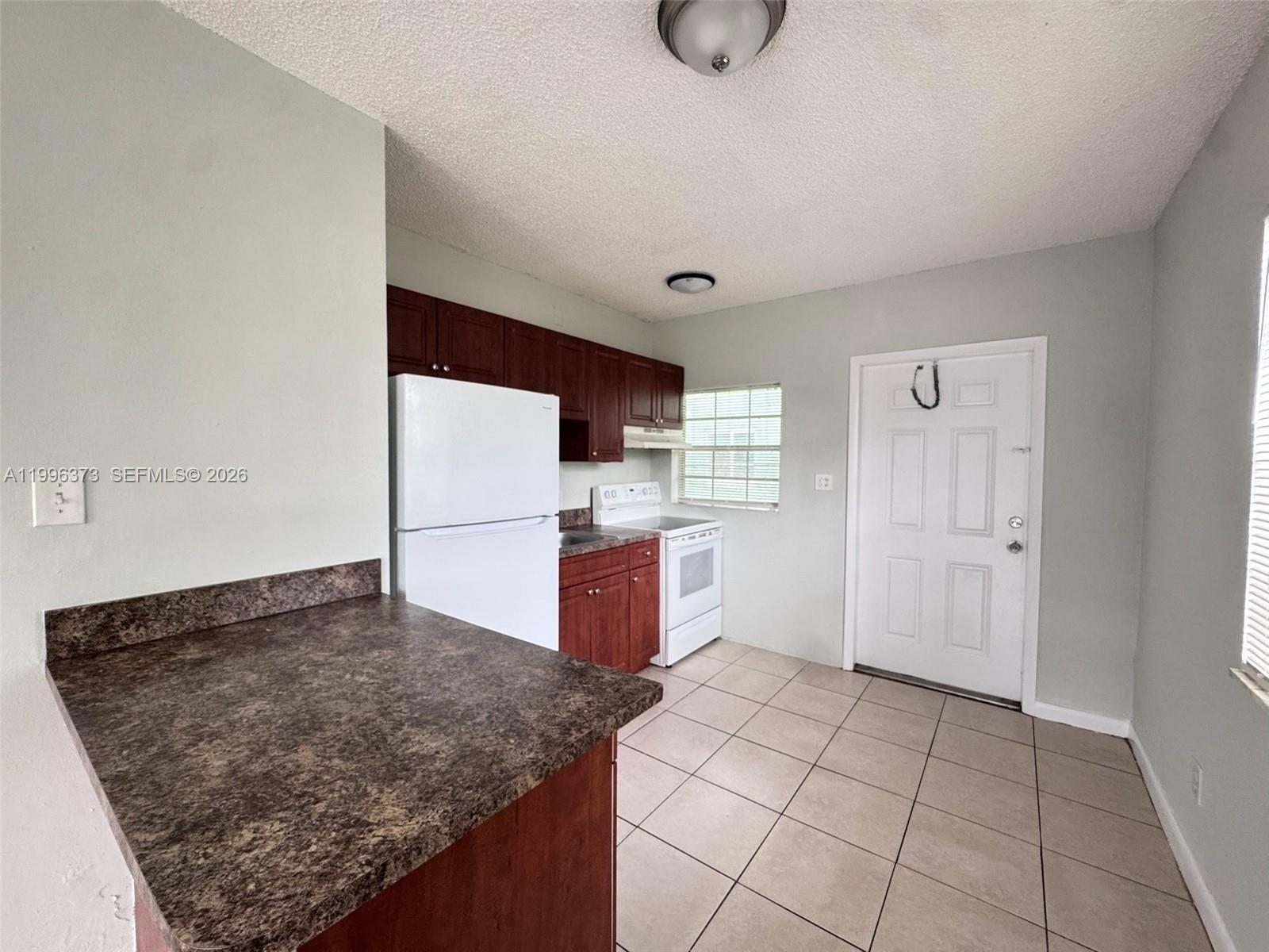 990 Phippen Waiters Road, Unit 12 Dania Beach, FL 33004 - Photo 3 of 11