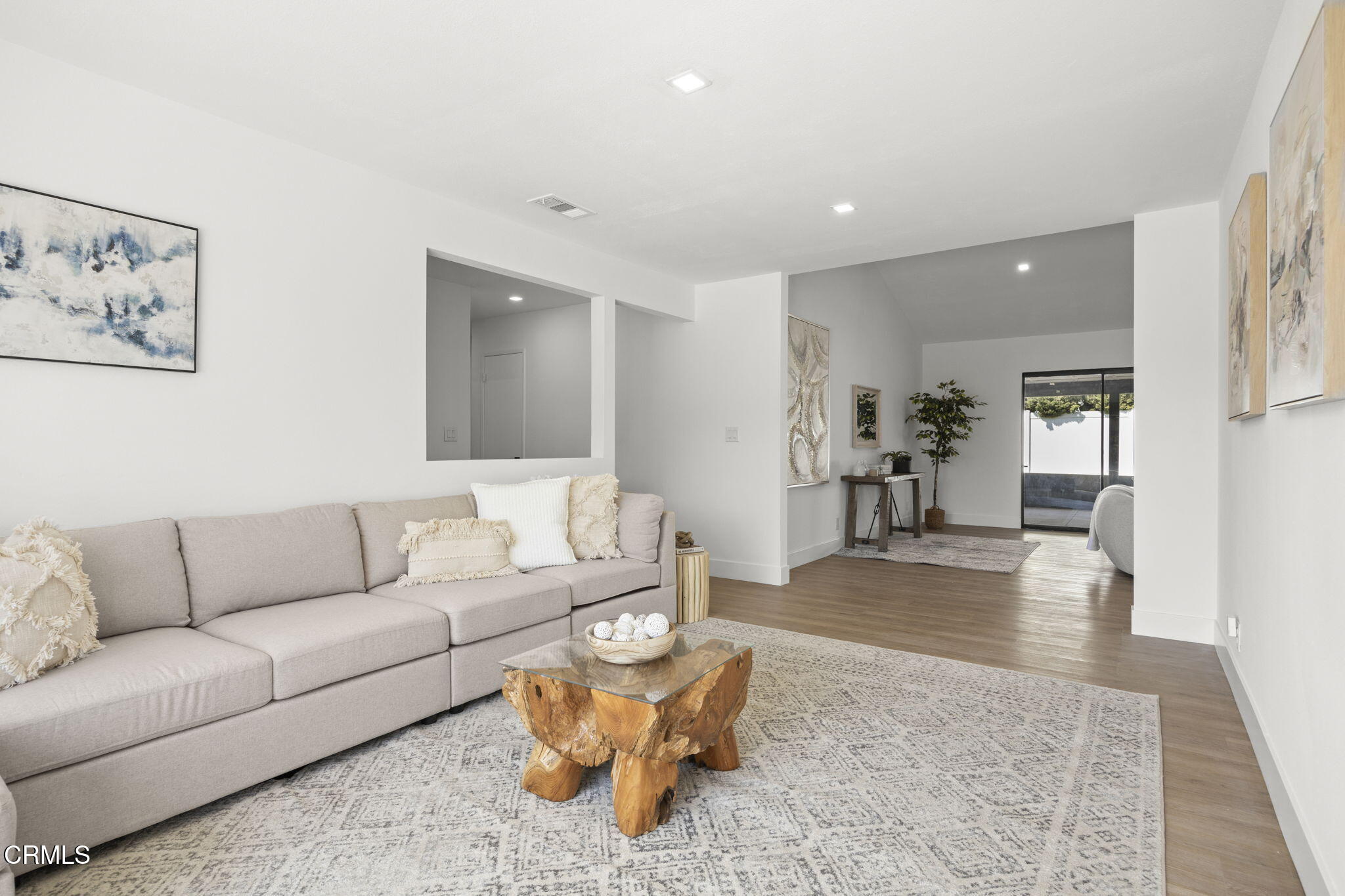 921 Juneberry Place Oxnard, CA 93036 - Photo 11 of 20 a living room with furniture and wooden floor