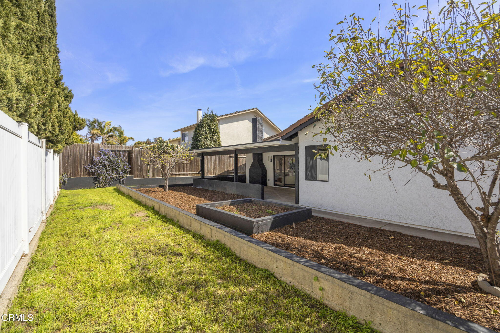 921 Juneberry Place Oxnard, CA 93036 - Photo 19 of 20 a view of house with a yard