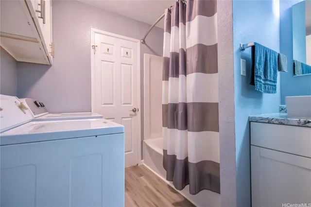 a bathroom with a sink and mirror