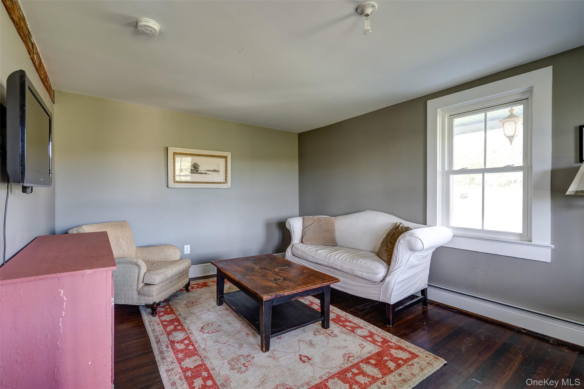 104 William Herbert Road Fremont Center, NY 12736 - Photo 12 of 43 a living room with furniture and a window