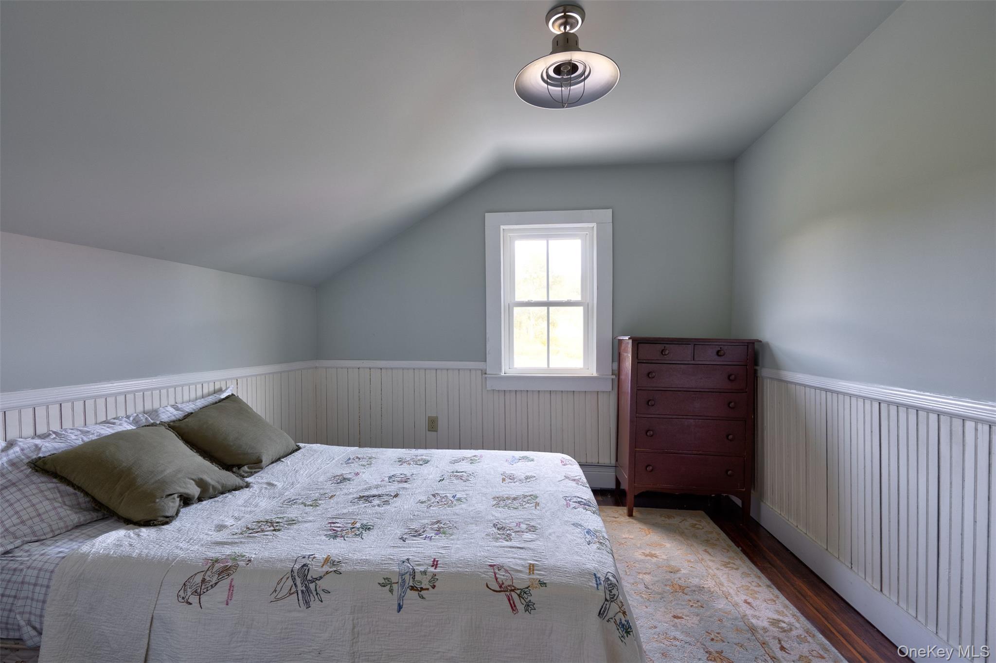 104 William Herbert Road Fremont Center, NY 12736 - Photo 20 of 43 a bedroom with a bed and a window